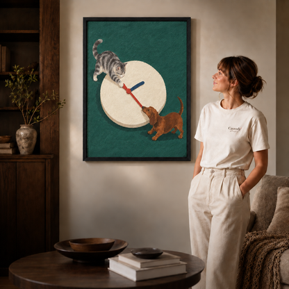 Black-framed cat and dachshund canvas wall art displayed above a coffee table near a neutral sofa.