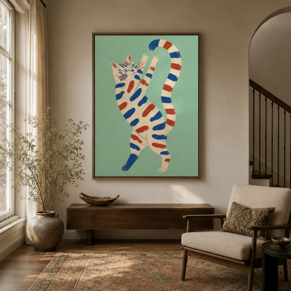 Whimsical striped dancing cat folk art canvas print hanging in a bright entryway above a wooden console