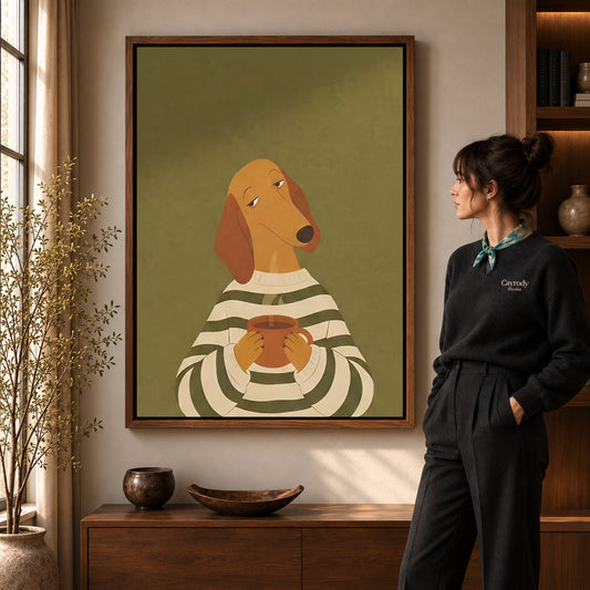 Coffee dog canvas art in a walnut frame beside a woman in a warmly lit living room.