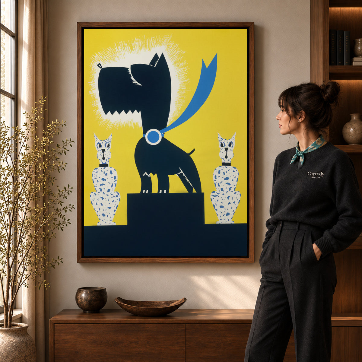 Black terrier canvas art displayed in a walnut frame against a warm wall near a wooden console.