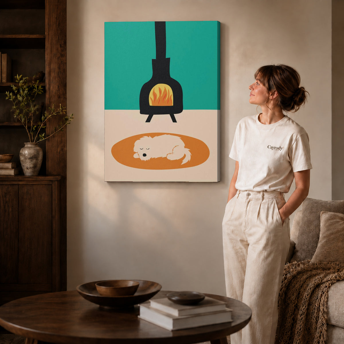 Fireplace dog canvas art on gallery wrapped canvas with a visible shaded side edge beside a woman.