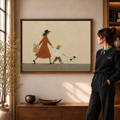 Family walk canvas art in a walnut frame beside a woman in a warmly lit living room.