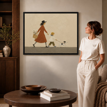 Family walk canvas art displayed in a black frame beside a woman, with soft room lighting.