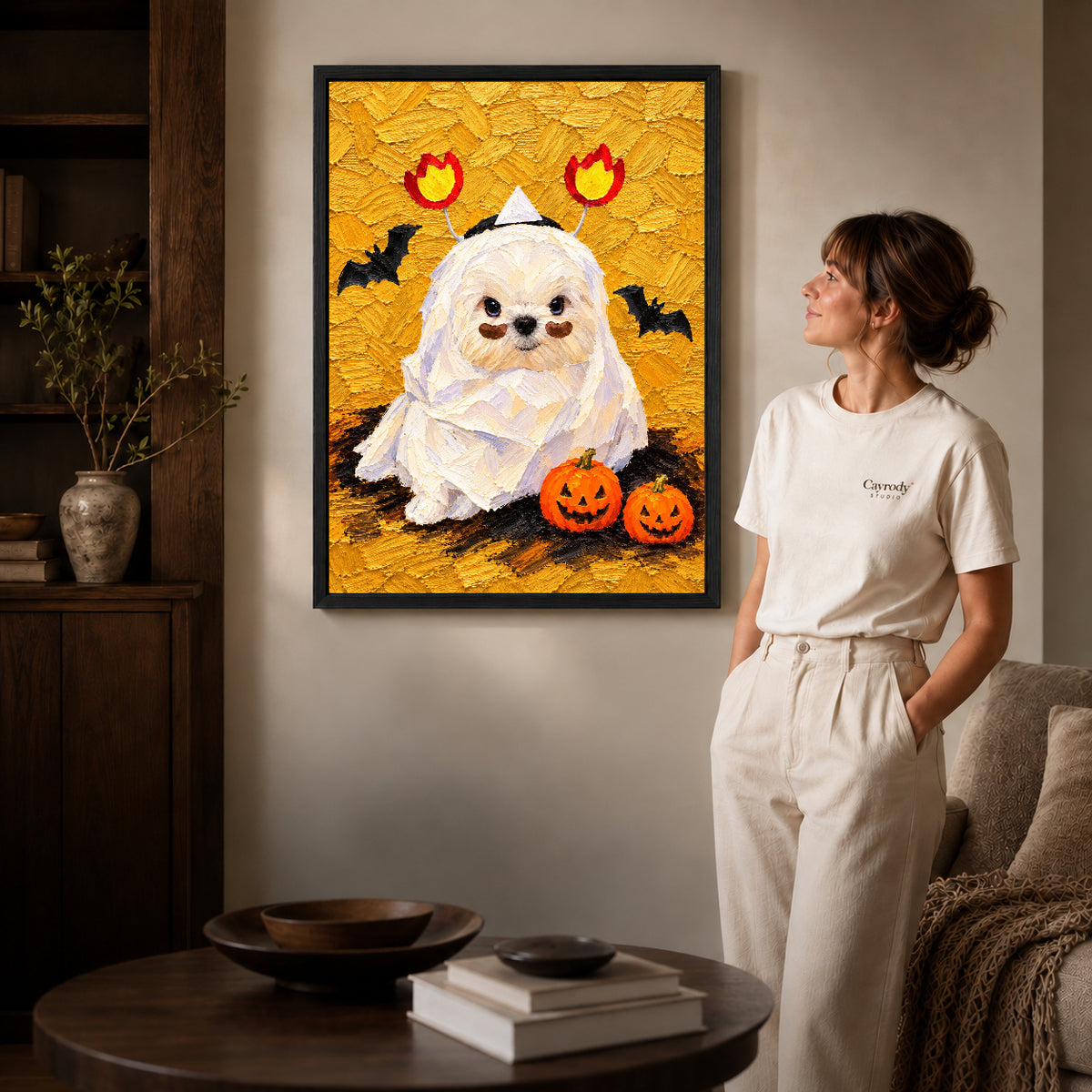 Mummy Puppy canvas art in a black frame above books in a welcoming living room.
