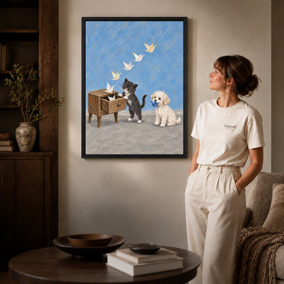 Black framed paper crane pets canvas art displayed beside a woman in a warm living room.