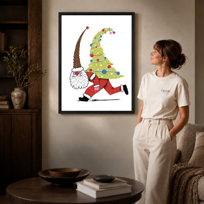 Christmas gnome canvas art displayed in a black frame above books in a cozy living room.