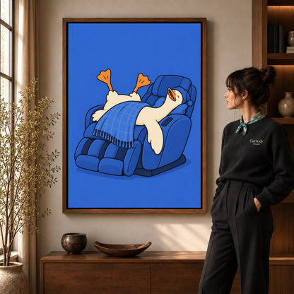 Relaxing duck canvas wall art in a walnut frame, featuring a blue recliner and sleeping white duck.