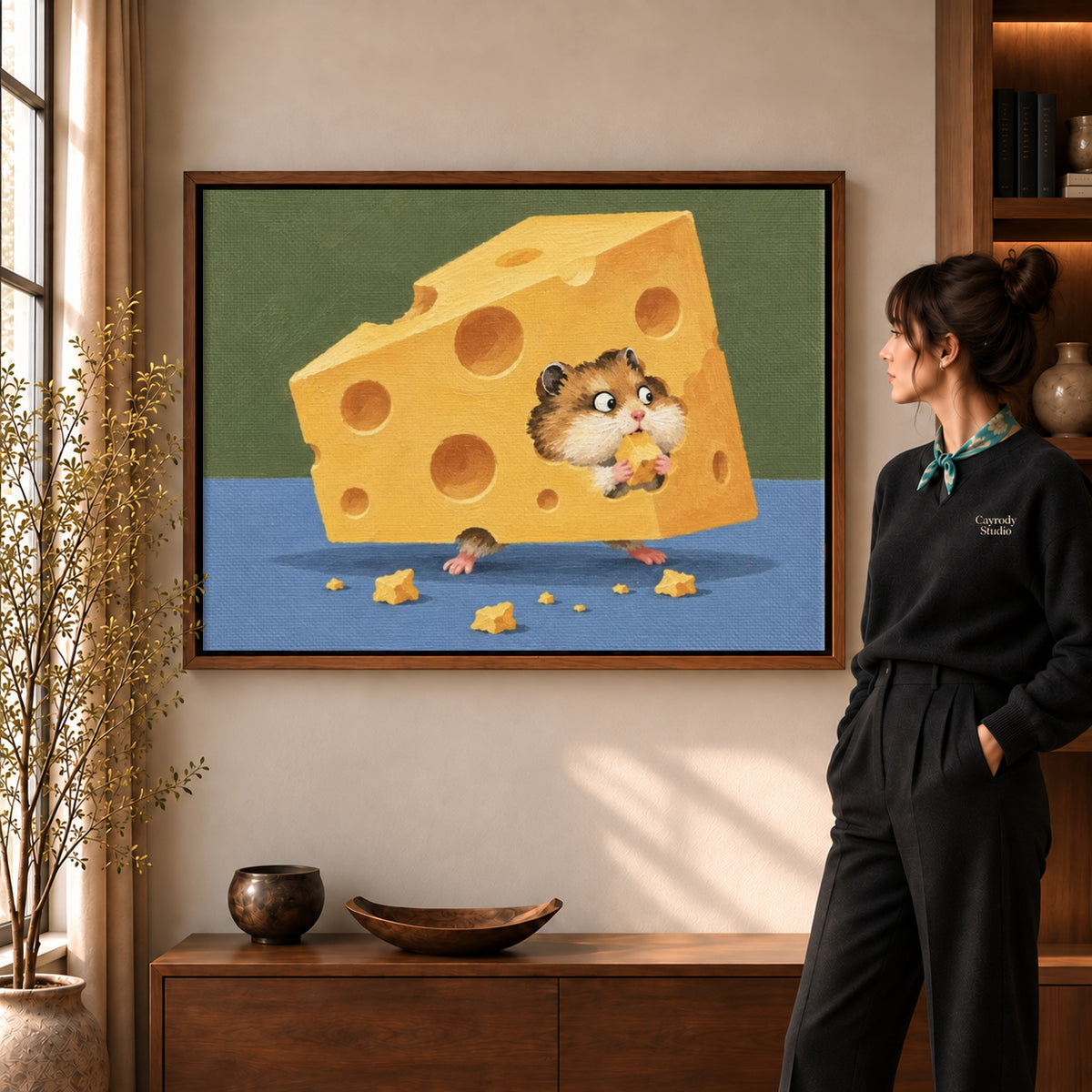 Cheese hamster canvas art displayed in a walnut frame against a warm wall near a wooden console.