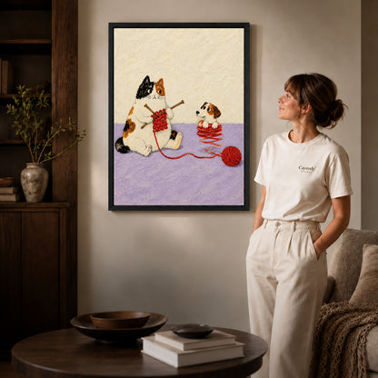 Knitting Cat canvas art in a black frame above books in a welcoming living room.