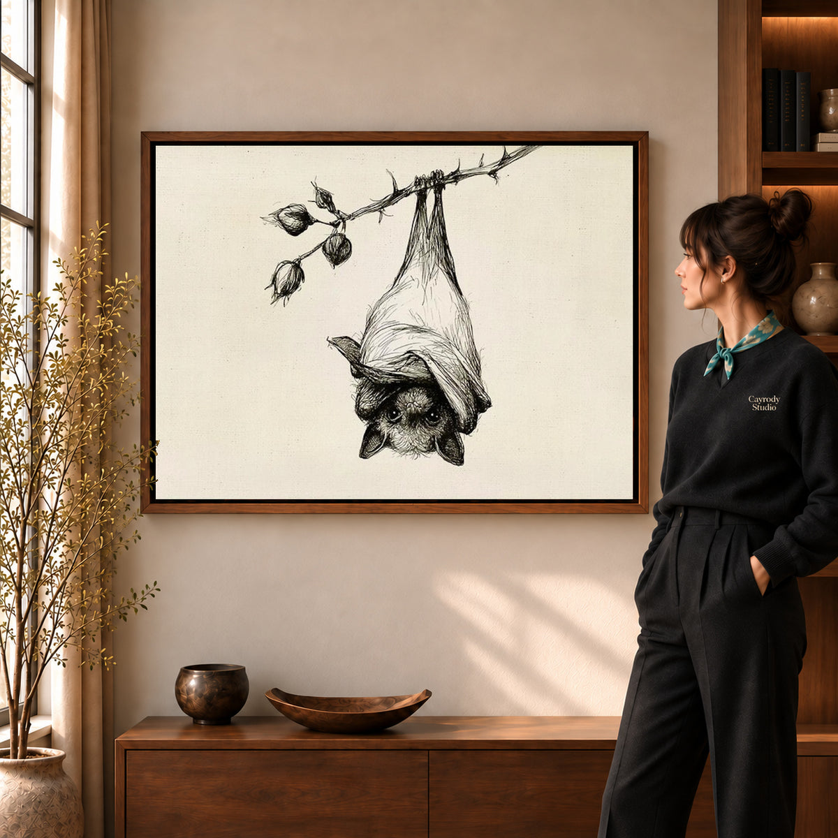 Walnut framed hanging bat canvas art shown beside a standing woman and a wooden console.