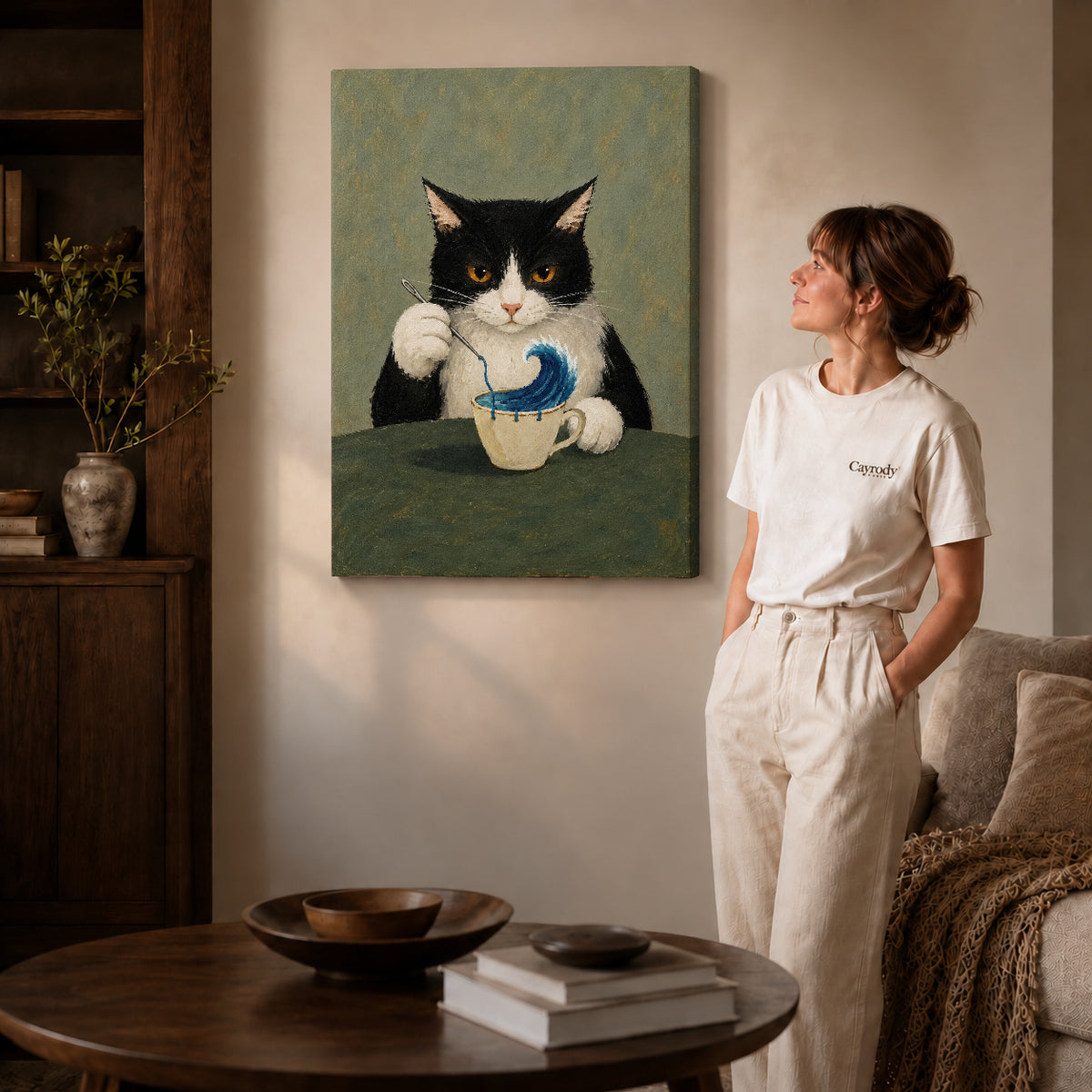 Ocean Teacup canvas art displayed as gallery wrapped canvas beside a woman in natural light.