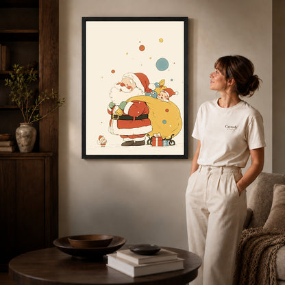 Black framed little santa canvas art displayed beside a woman in a warm living room.
