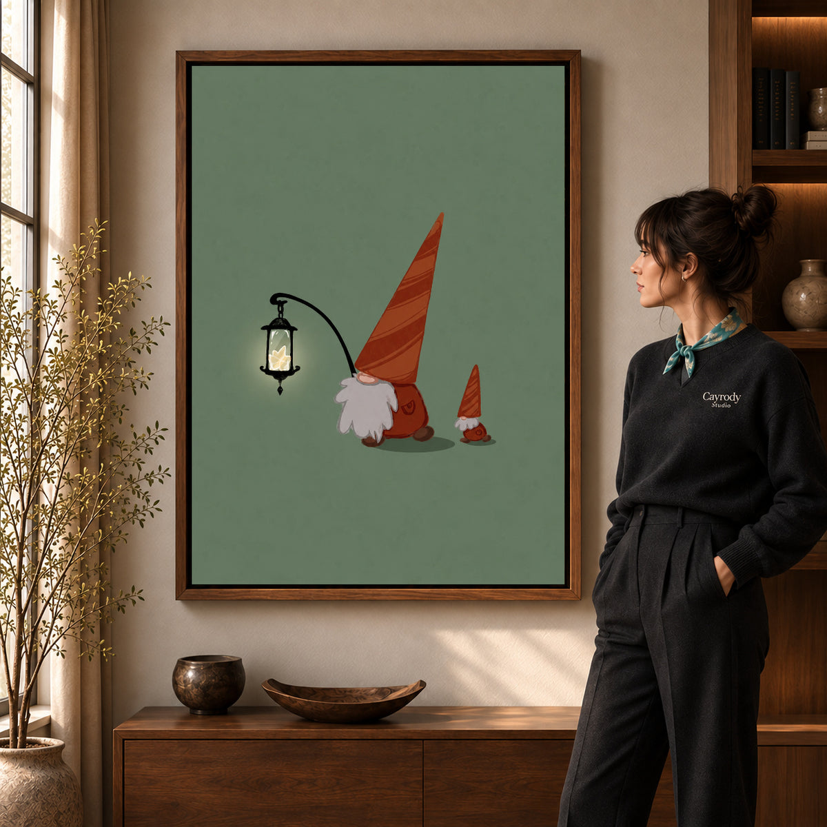Walnut framed lantern gnomes canvas art shown beside a standing woman and a wooden console.