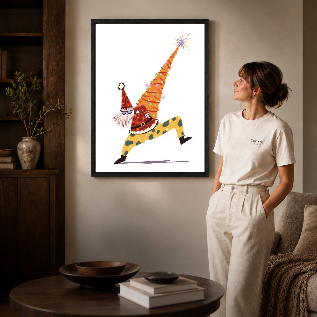 Christmas Gnome canvas art in a black frame above books in a welcoming living room.