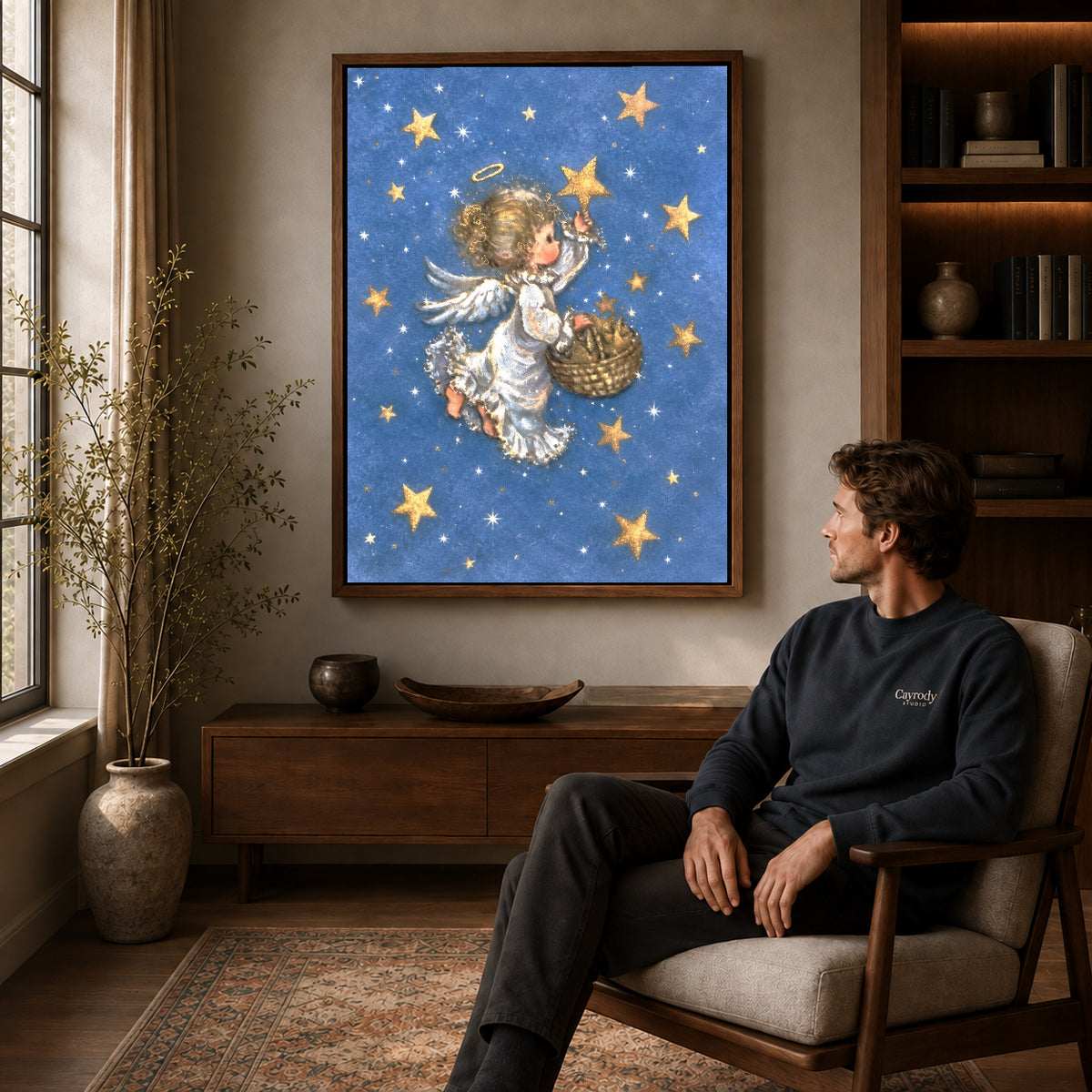 Starlight Angel canvas art above a wooden console beside a seated man in a warm room.