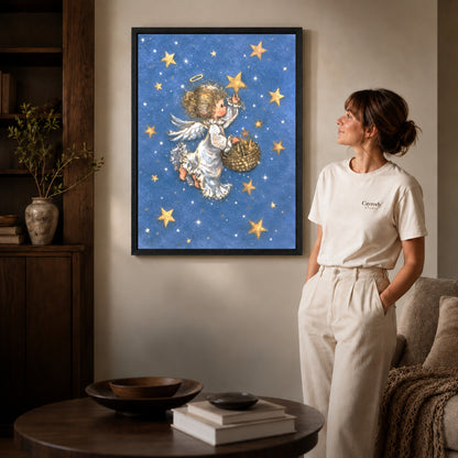 Black framed starlight angel canvas art displayed beside a woman in a warm living room.