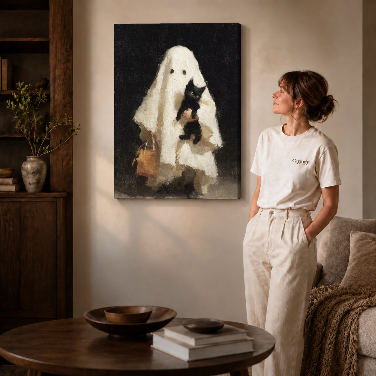Gallery wrapped gentle ghost canvas art with visible canvas edges beside a standing woman.