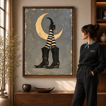 Walnut framed moonlit witch boots canvas art shown beside a standing woman and a wooden console.