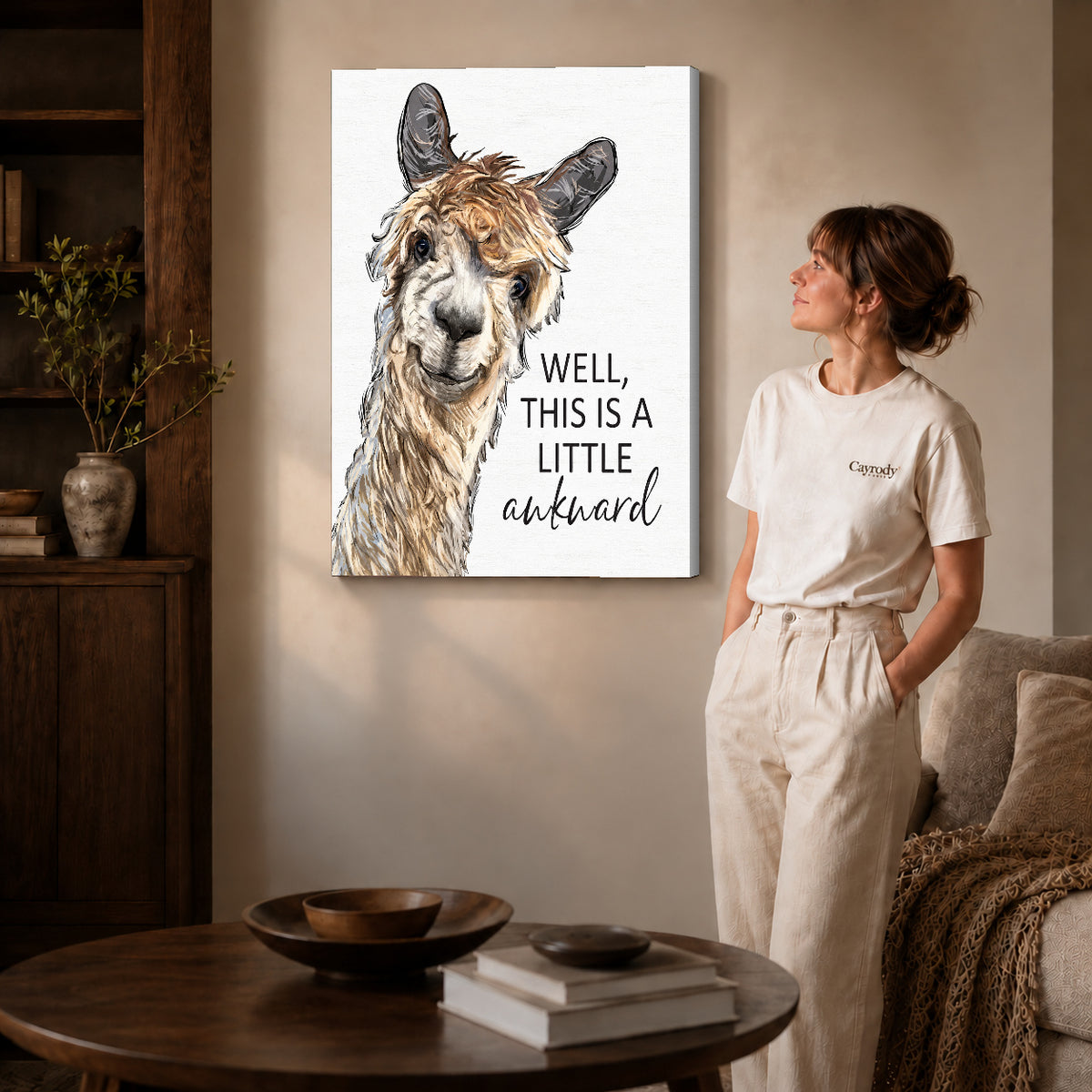 Gallery wrapped awkward alpaca canvas art with visible canvas edges beside a standing woman.
