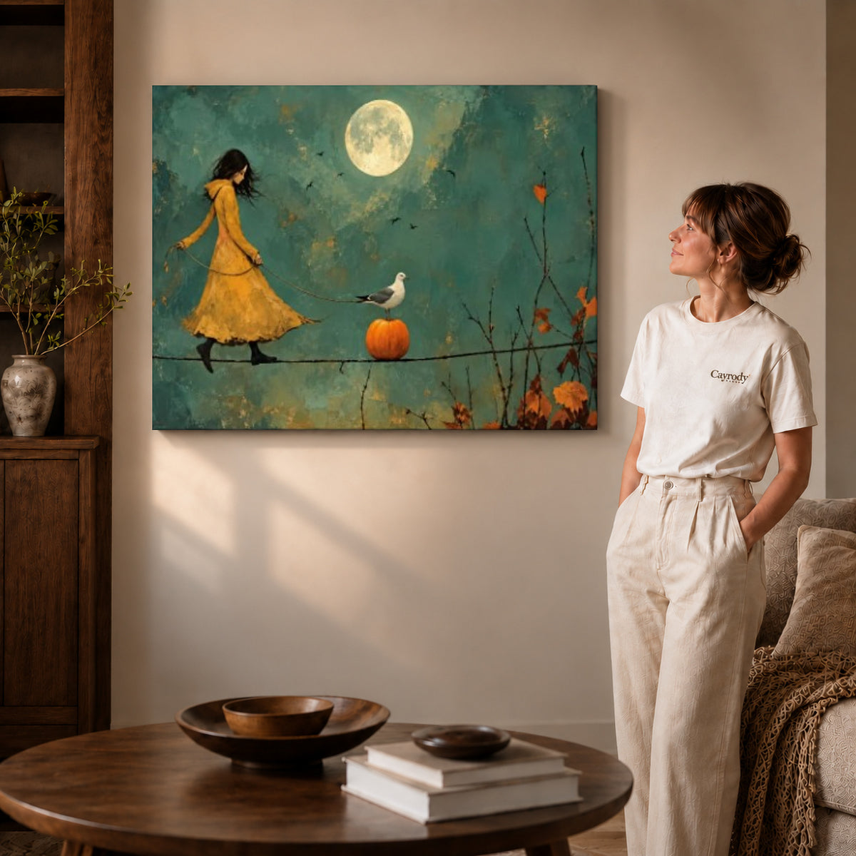 Gallery wrapped moonlit tightrope canvas art with visible canvas edges beside a standing woman.