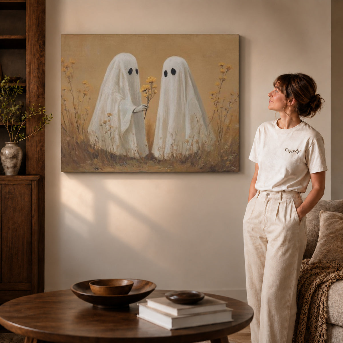 Gallery wrapped ghost flower gift canvas art with visible canvas edges beside a standing woman.