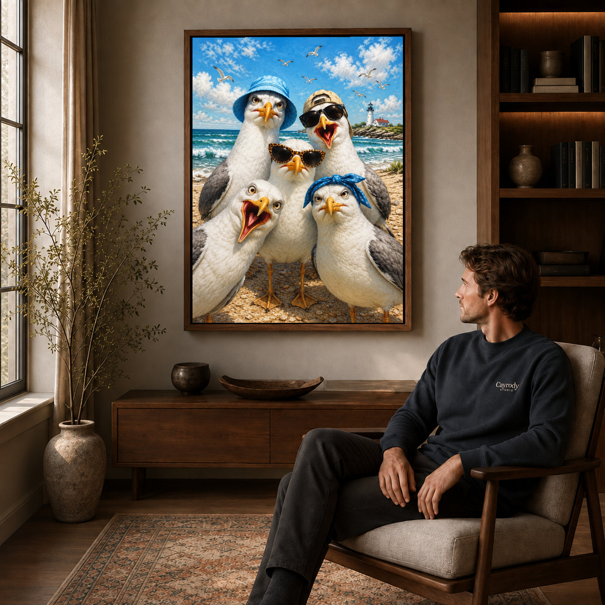 Beach Seagull Selfie canvas art above a wooden console beside a seated man in a warm room.