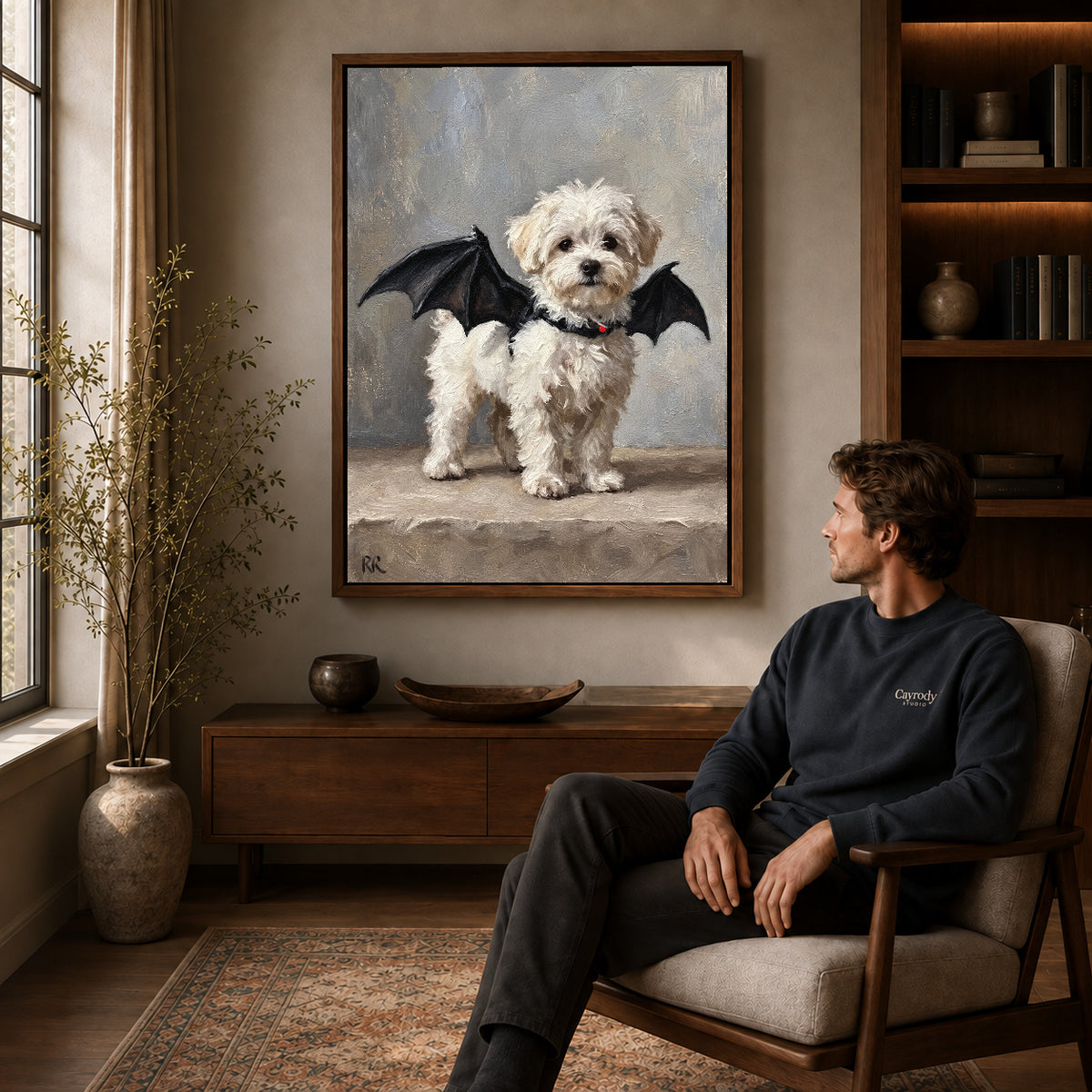 Bat Wing Puppy canvas art above a wooden console beside a seated man in a warm room.