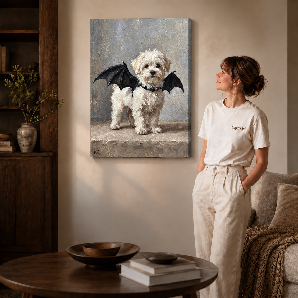 Bat Wing Puppy canvas art displayed as gallery wrapped canvas beside a woman in natural light.
