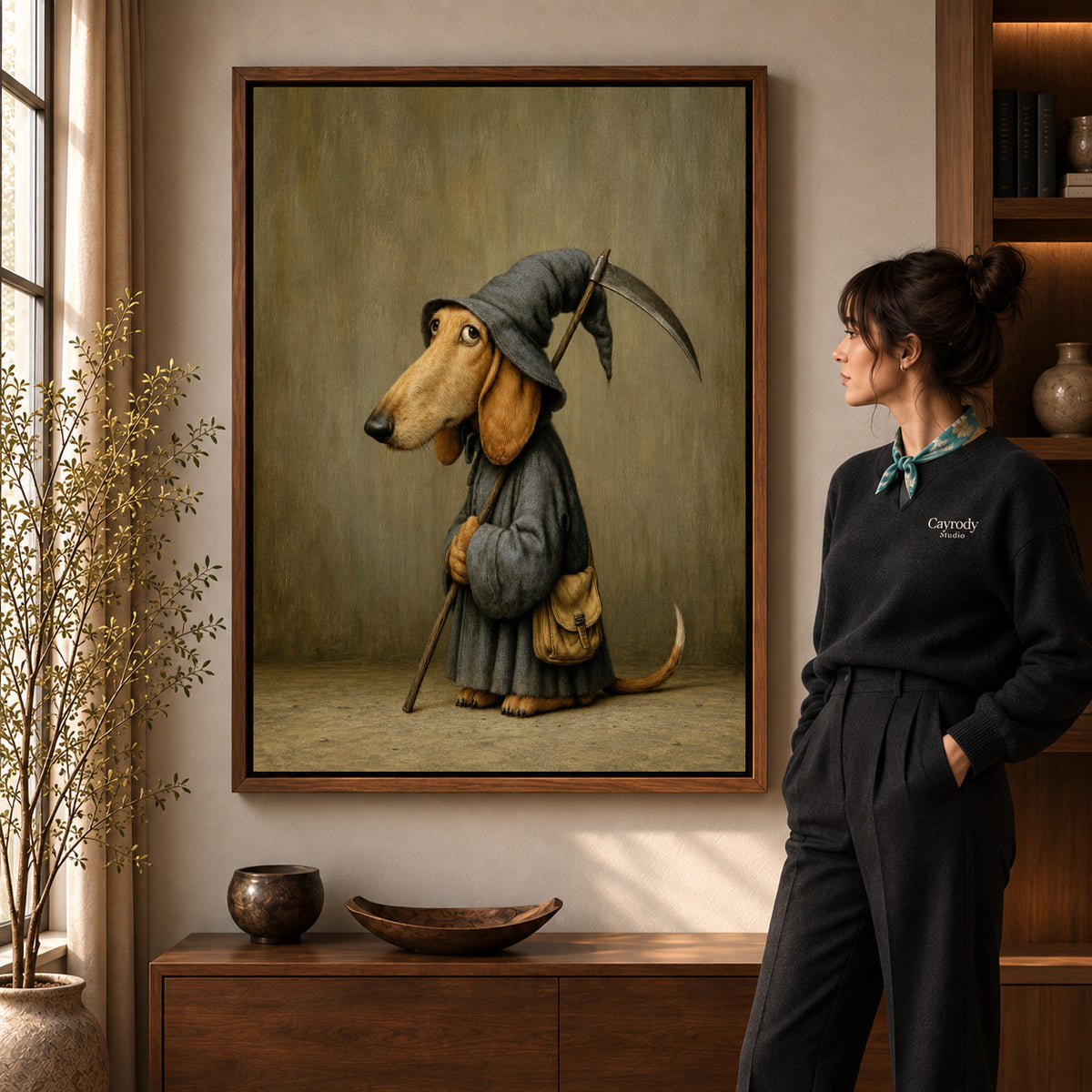 Walnut framed reaper dachshund canvas art shown beside a standing woman and a wooden console.