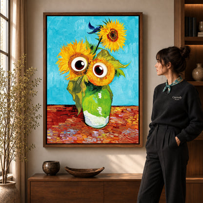 Googly Sunflowers canvas art in a walnut frame beside a standing woman and wooden console.