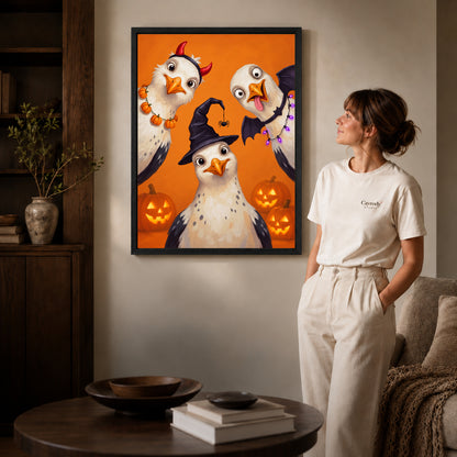Halloween Bird Trio canvas art in a black frame above books in a welcoming living room.