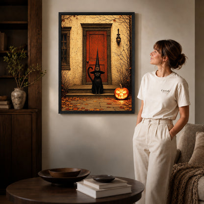 Porch Witch Cat canvas art in a black frame above books in a welcoming living room.