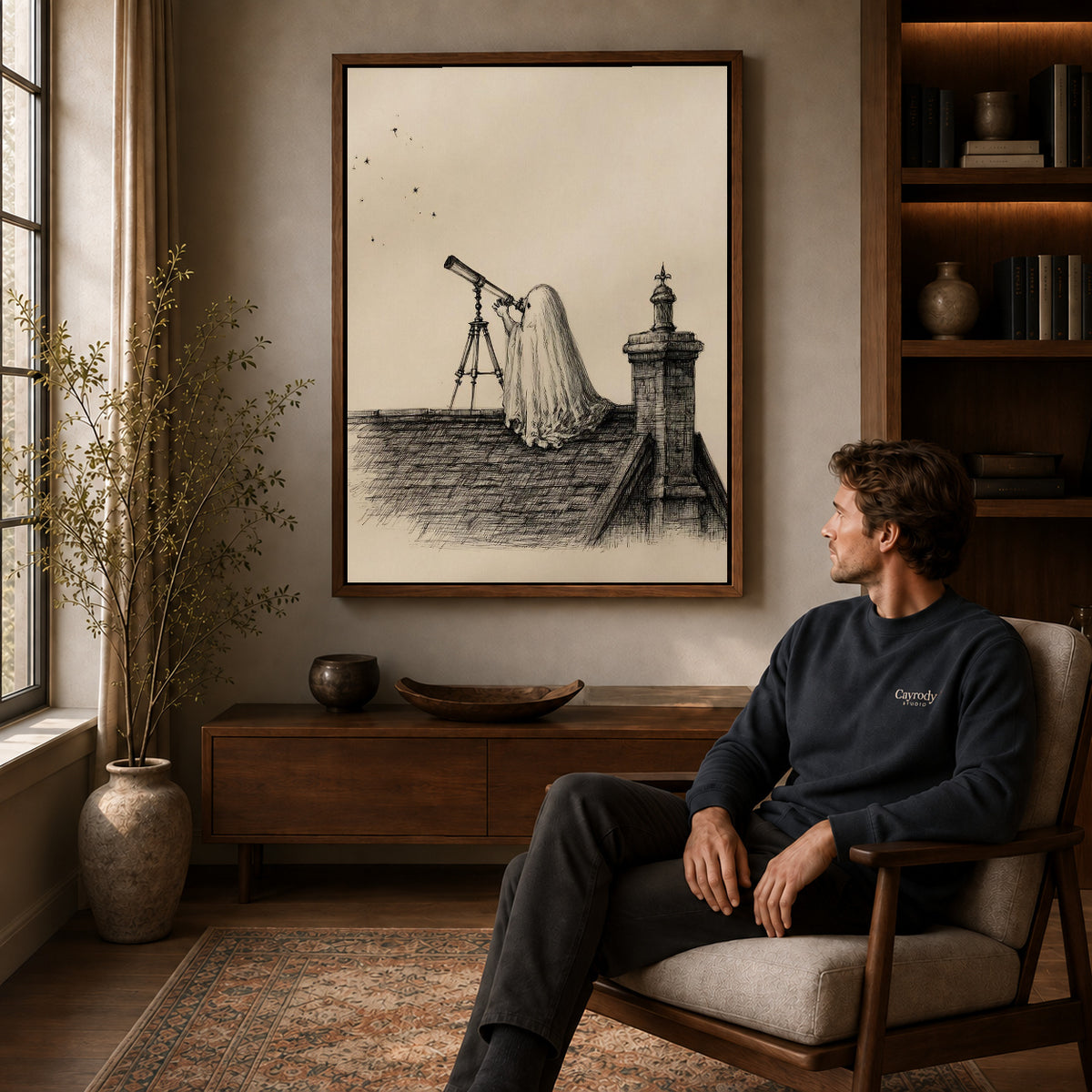 Stargazing Ghost canvas art above a wooden console beside a seated man in a warm room.
