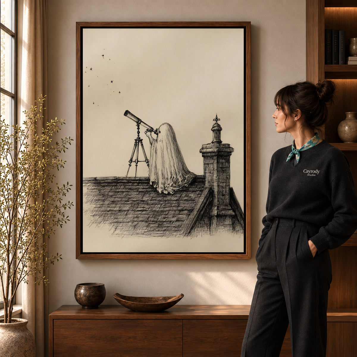 Walnut framed stargazing ghost canvas art shown beside a standing woman and a wooden console.