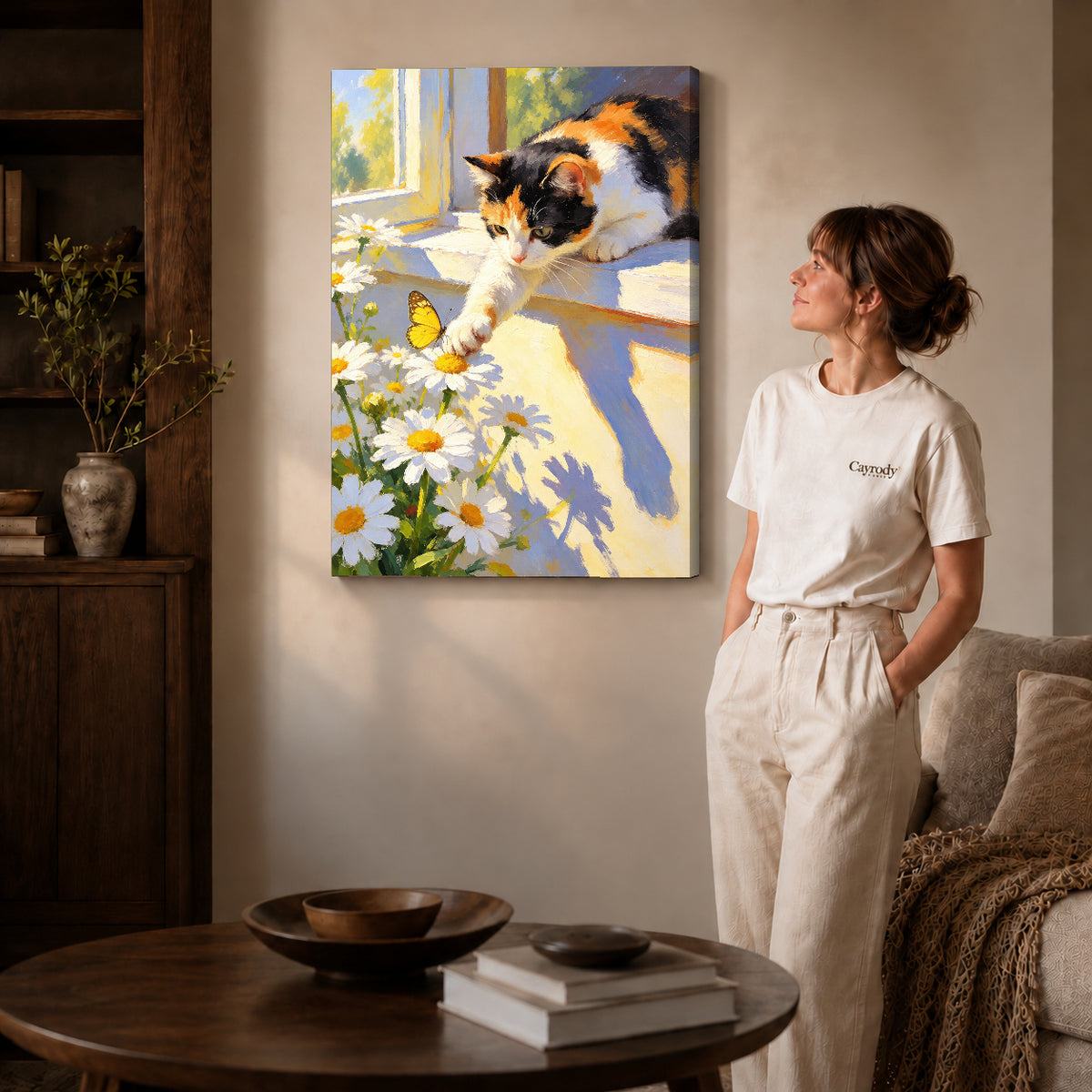 Butterfly Window Cat canvas art displayed as gallery wrapped canvas beside a woman in natural light.