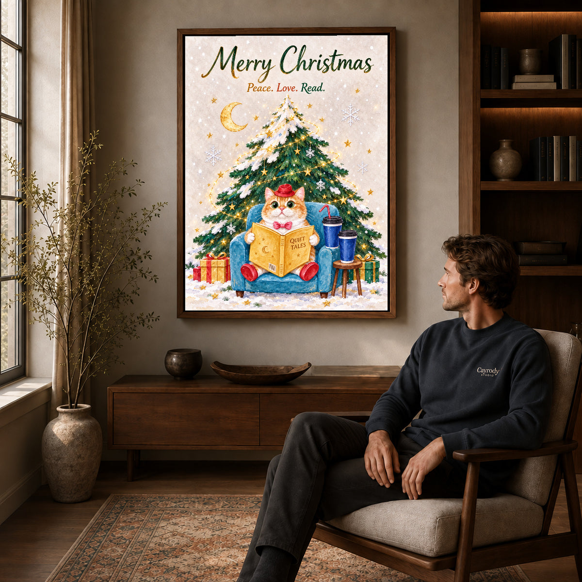 Christmas Reader canvas art above a wooden console beside a seated man in a warm room.