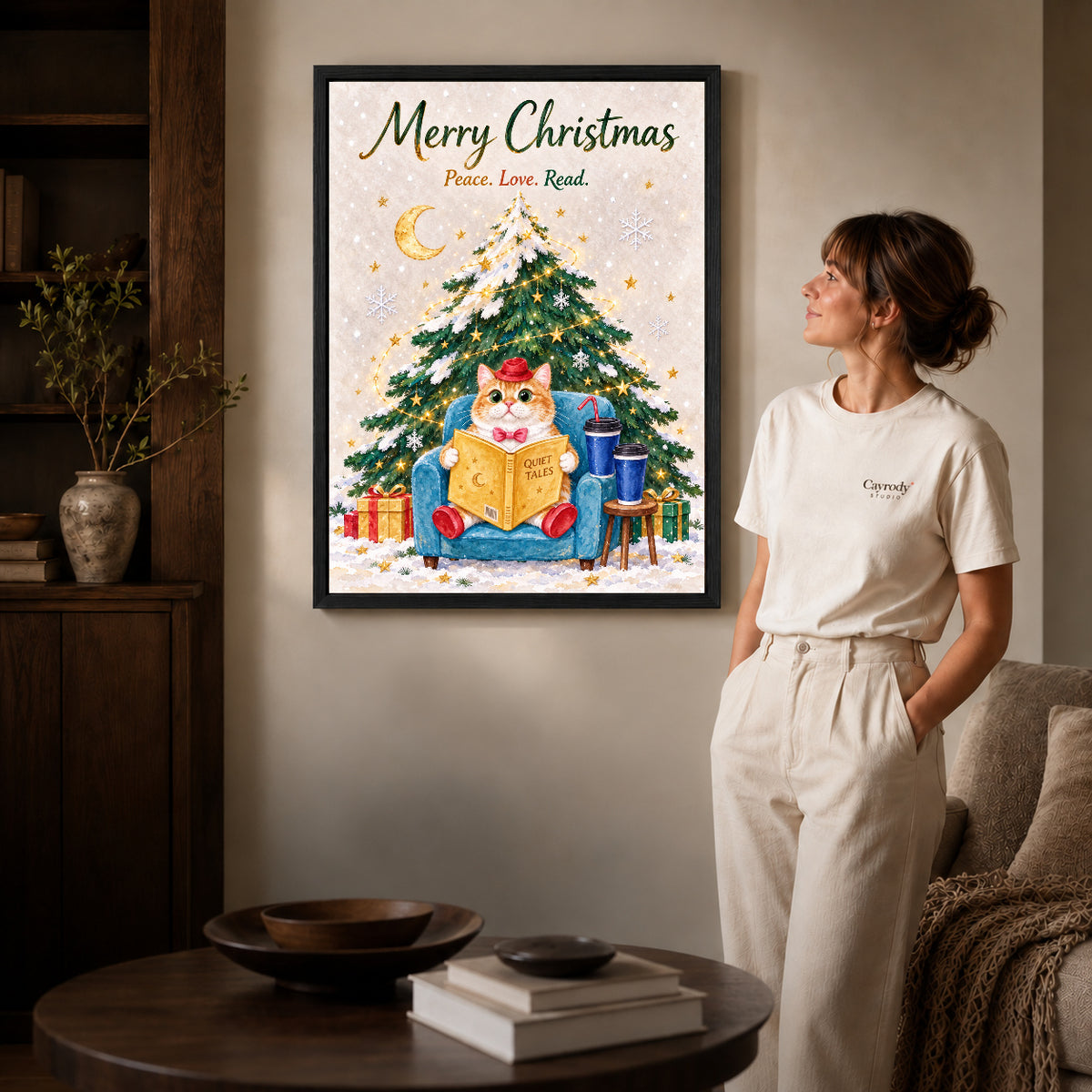 Christmas Reader canvas art in a black frame above books in a welcoming living room.