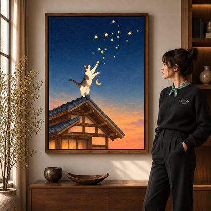 Stargazing Rooftop Cat canvas art in a walnut frame beside a standing woman and wooden console.