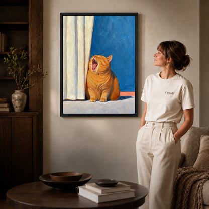 Black framed yawning orange cat canvas art displayed beside a woman in a warm living room.