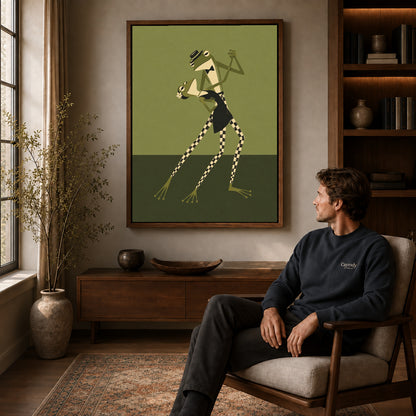 Dancing Frogs canvas art above a wooden console beside a seated man in a warm room.
