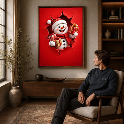 Gift Giving Snowman canvas art above a wooden console beside a seated man in a warm room.