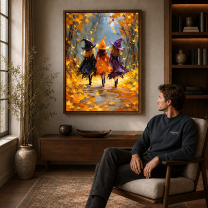 Autumn Witch Friends canvas art above a wooden console beside a seated man in a warm room.
