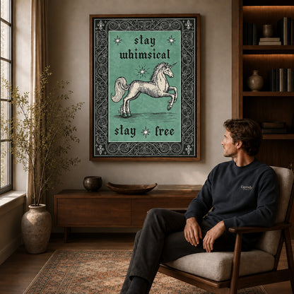 Free Spirit Unicorn canvas art above a wooden console beside a seated man in a warm room.