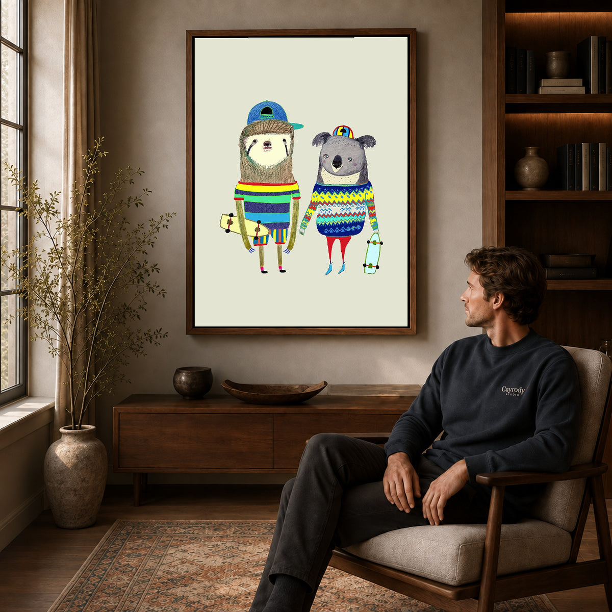 Skateboard Friends canvas art above a wooden console beside a seated man in a warm room.