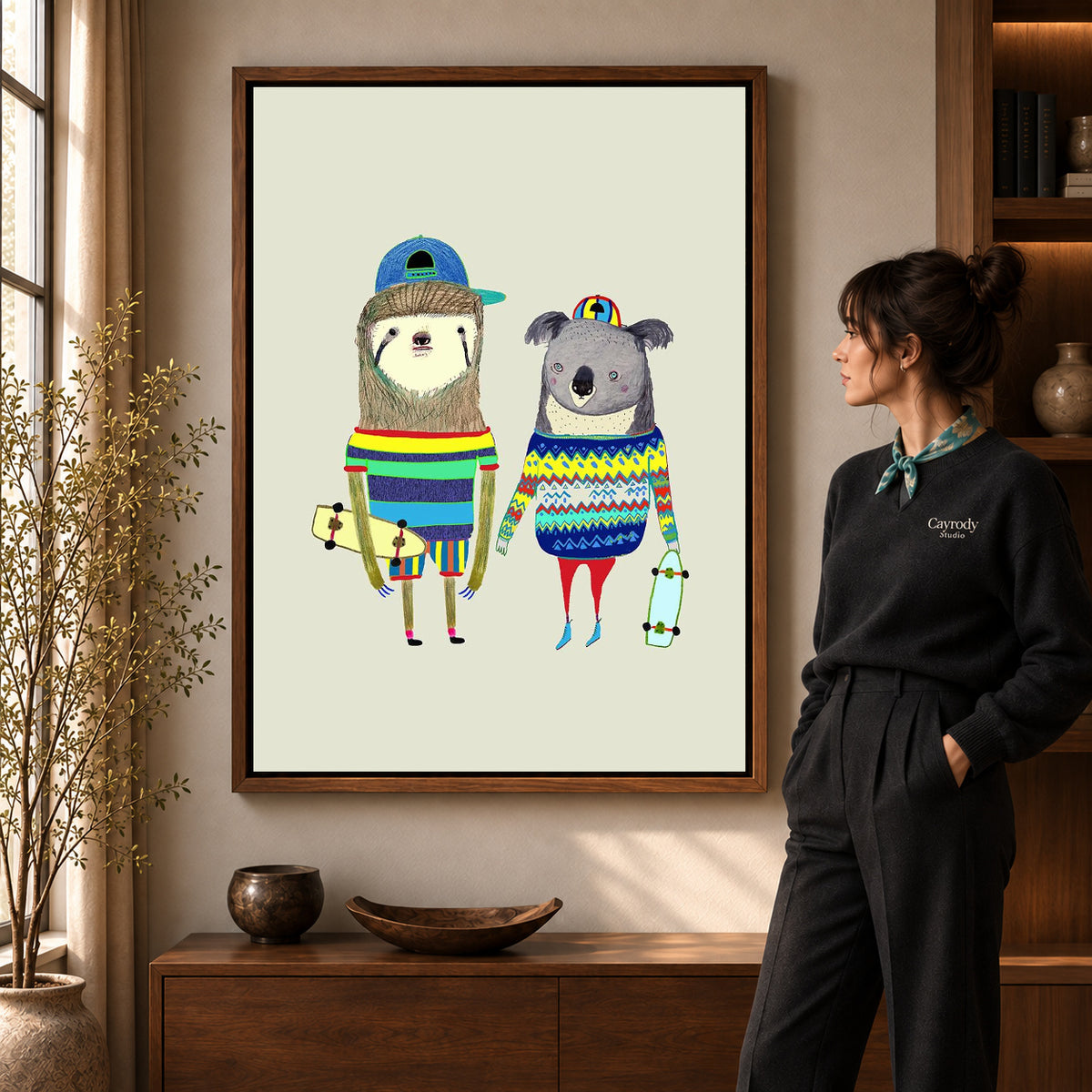 Walnut framed skateboard friends canvas art shown beside a standing woman and a wooden console.