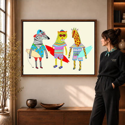 Surfing Animals canvas art in a walnut frame beside a standing woman and wooden console.