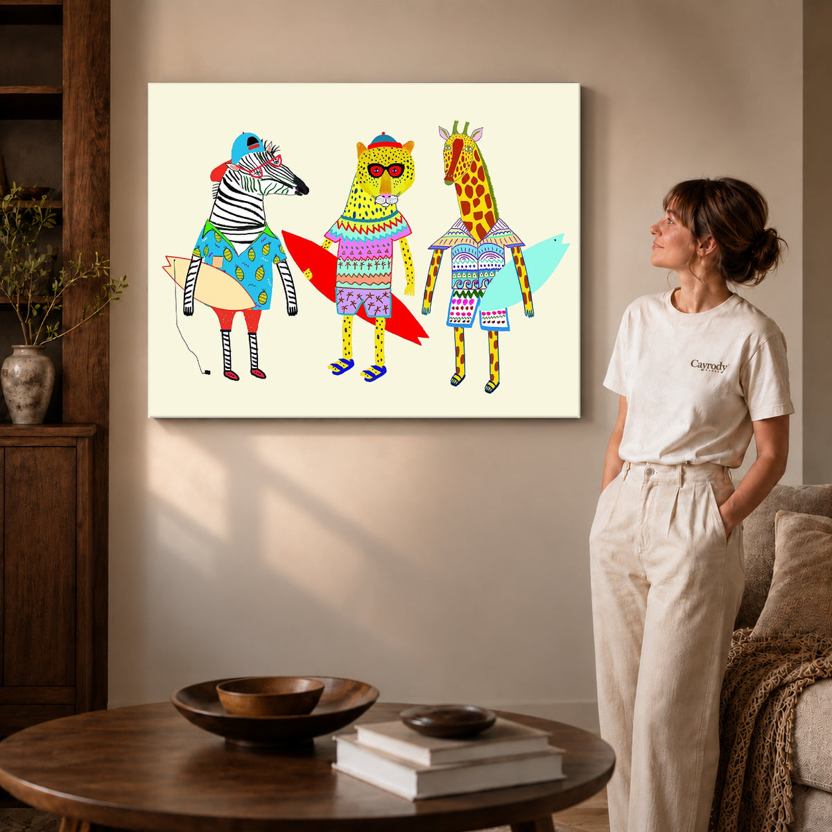 Surfing Animals canvas art displayed as gallery wrapped canvas beside a woman in natural light.
