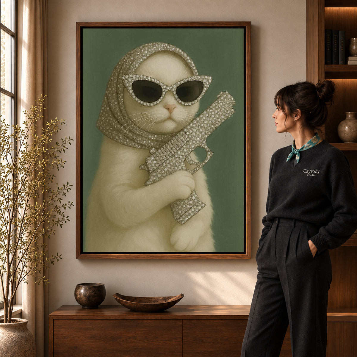 Glamorous Cat canvas art in a walnut frame beside a standing woman and wooden console.
