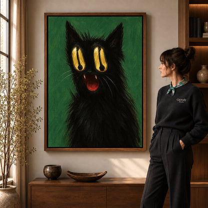 Golden Eyed Cat canvas art in a walnut frame beside a standing woman and wooden console.