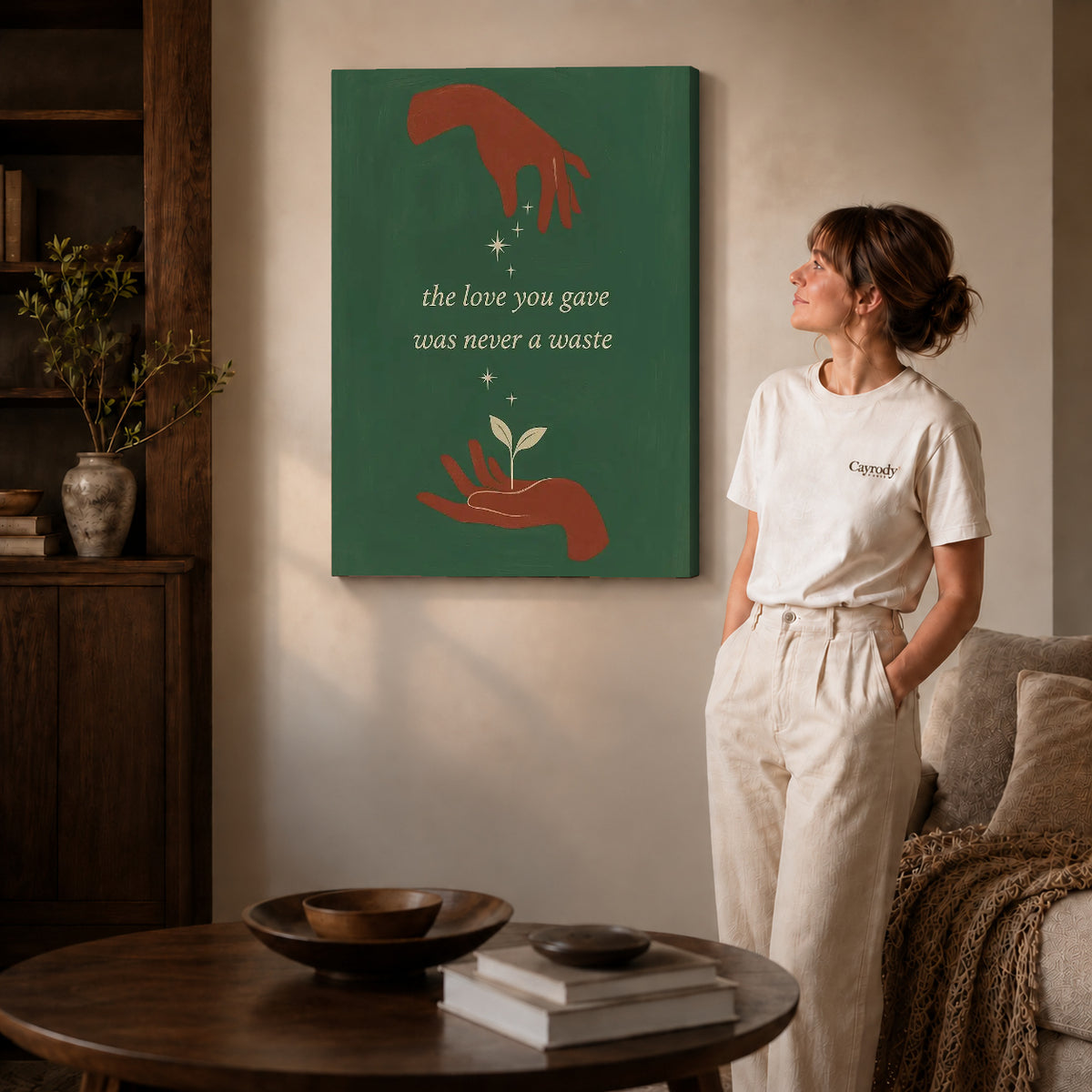Growing Love canvas art displayed as gallery wrapped canvas beside a woman in natural light.